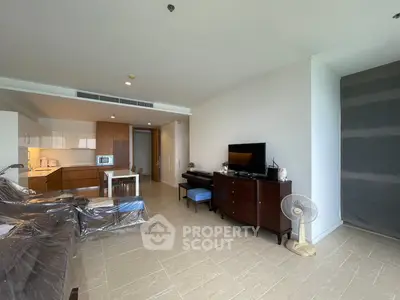 Spacious modern living room with open kitchen and stylish furnishings