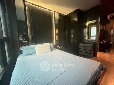 Luxurious bedroom with modern design and ambient lighting