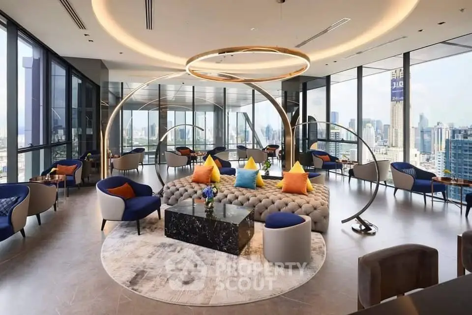 Luxurious modern living room with panoramic city views and elegant circular lighting fixtures.