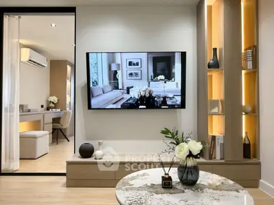 Modern living room with elegant decor and wall-mounted TV