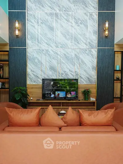 Luxurious living room with elegant decor and modern entertainment setup