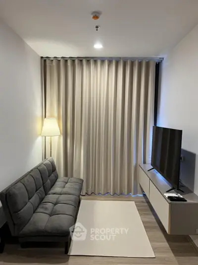 Modern living room with sleek furniture and ambient lighting