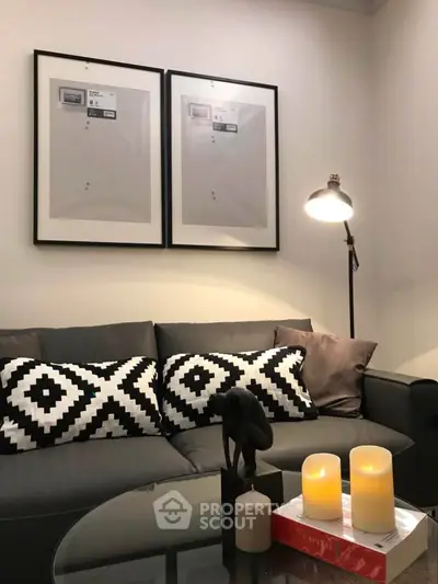 Stylish living room with modern decor, cozy sofa, and ambient lighting for a welcoming atmosphere.