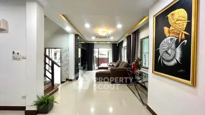 Spacious modern living room with elegant decor and large windows