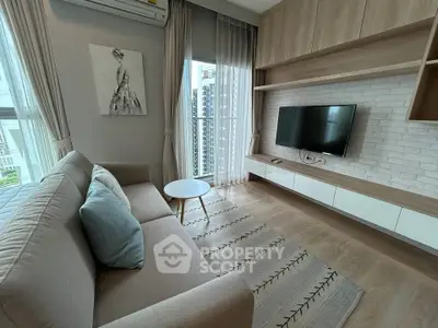 Modern living room with stylish decor, featuring a cozy sofa, wall-mounted TV, and large window with city view.