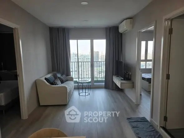 Modern living room with balcony view in a stylish apartment