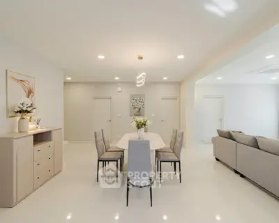 Elegant dining area with modern decor and open layout in a spacious living room
