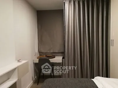 Cozy bedroom with study nook and modern decor