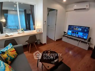 Cozy living room with modern decor and entertainment setup