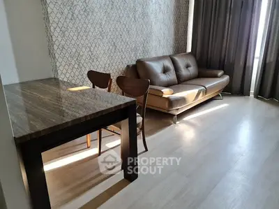 Modern living room with stylish furniture and natural light