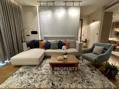 Stylish modern living room with elegant decor and cozy seating area.