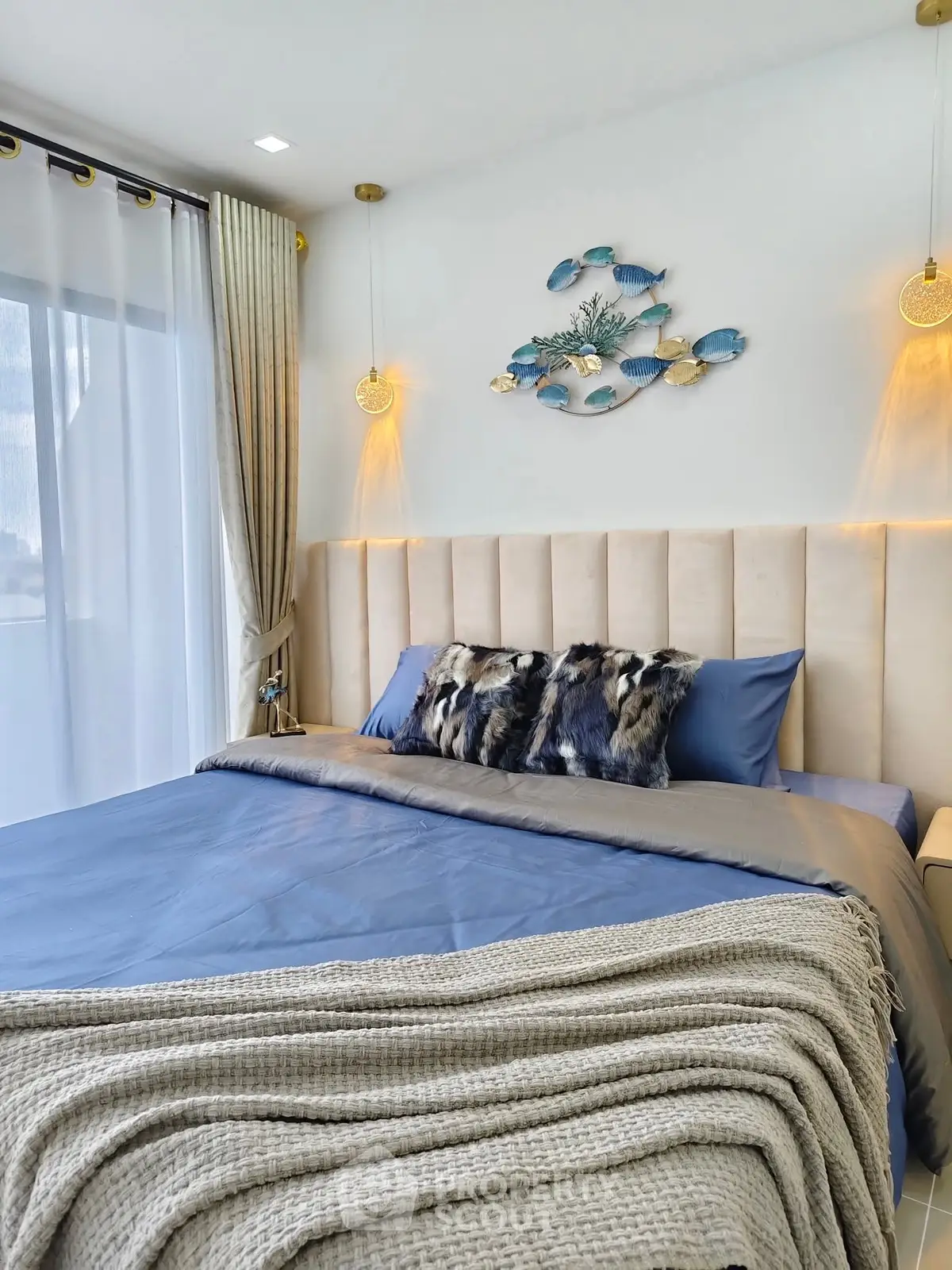 Luxurious bedroom with elegant decor and plush bedding