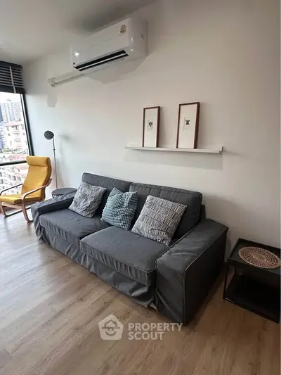 Modern living room with stylish sofa and city view