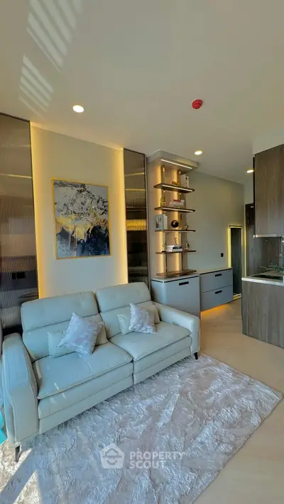 Modern living room with elegant decor and cozy white sofa