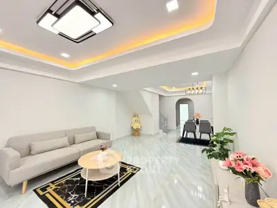 Modern living room with stylish lighting and elegant decor
