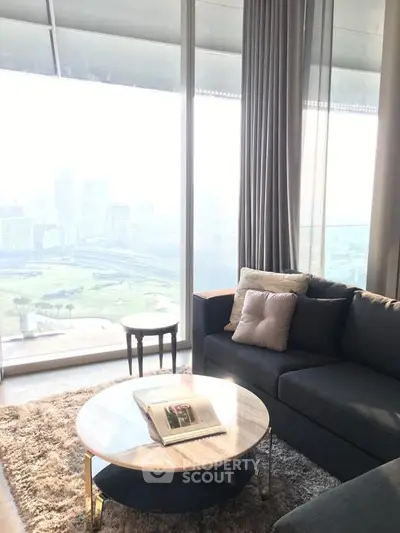Luxurious living room with panoramic city view, elegant furniture, and plush decor.