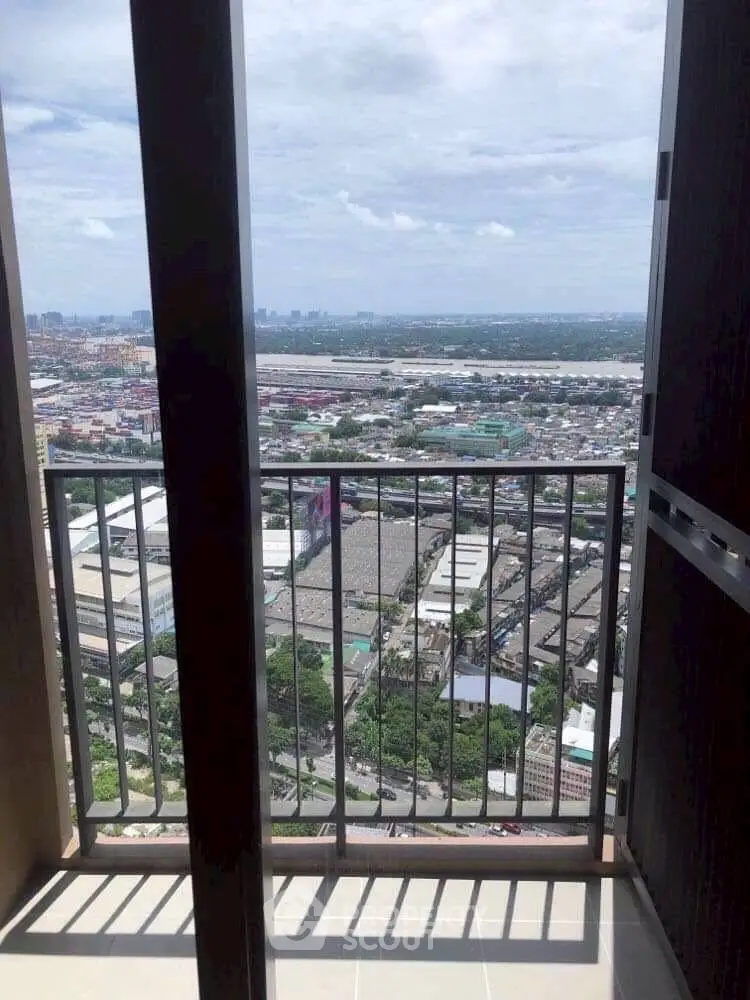 Stunning balcony view overlooking cityscape and skyline, perfect for urban living.