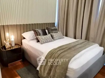 Cozy and stylish bedroom with modern decor and plush bedding, perfect for relaxation.