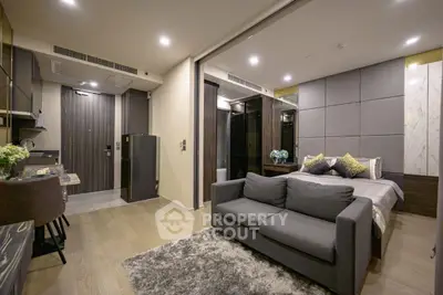 Modern studio apartment with cozy living area and stylish decor
