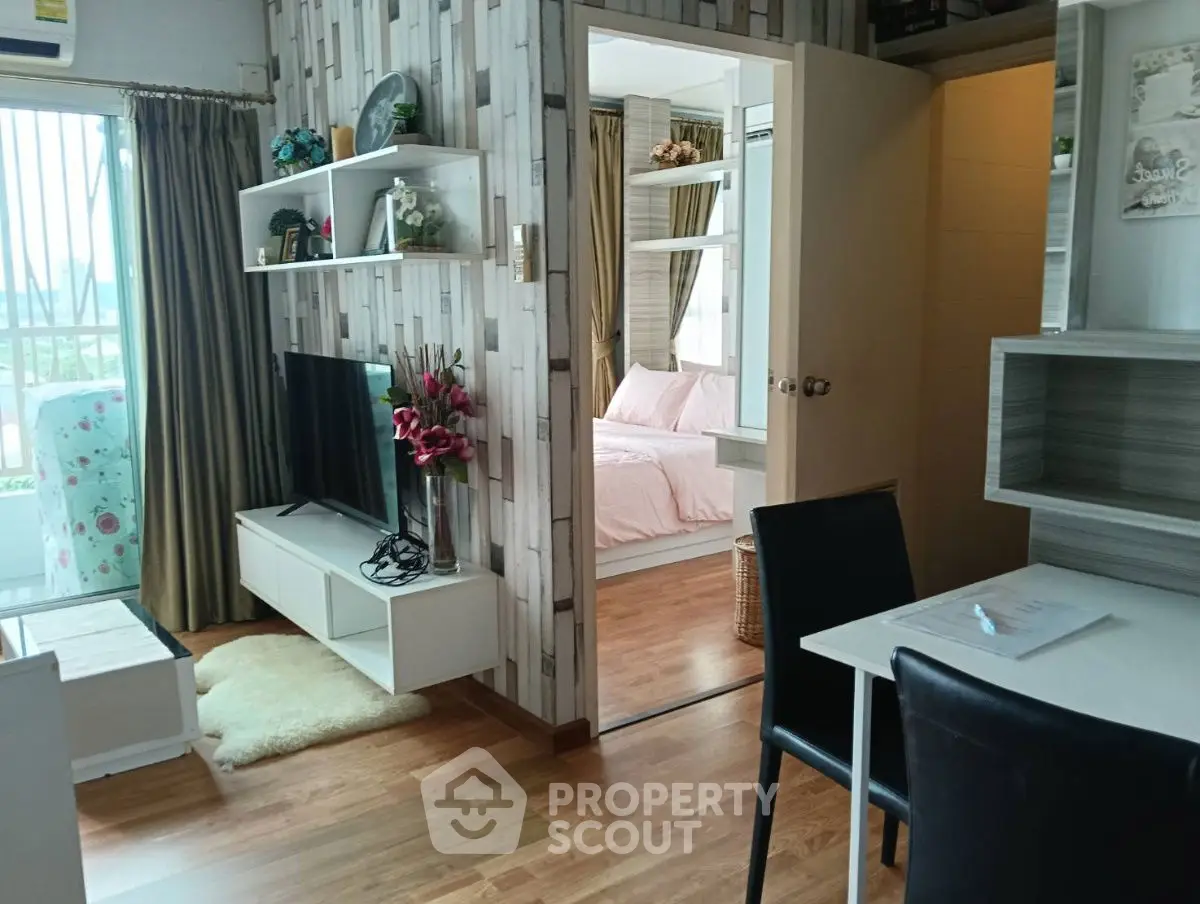 Charming modern apartment with cozy living room and stylish bedroom, perfect for urban living.