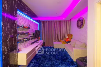 Modern living room with vibrant LED lighting and cozy decor