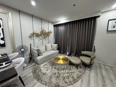 Modern living room with stylish decor and cozy seating area