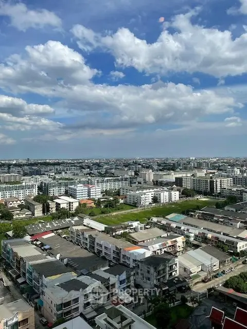 Stunning cityscape view from a high-rise building showcasing urban living.