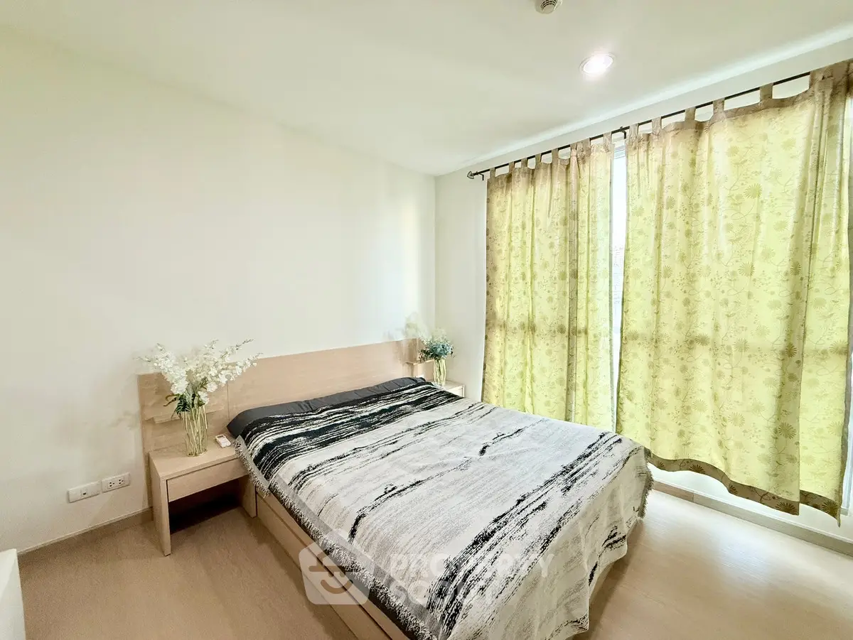 Cozy bedroom with natural light and modern decor