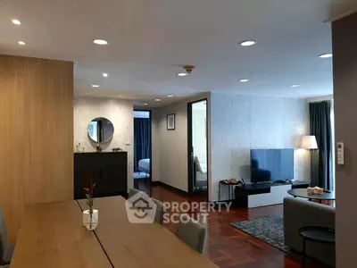 Spacious modern living room with elegant dining area and stylish decor