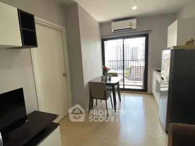 Modern apartment interior with dining area and balcony view