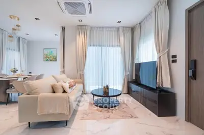 Modern living room with elegant decor and natural light