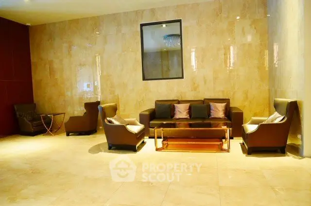 Luxurious lobby with elegant seating and modern decor in upscale building