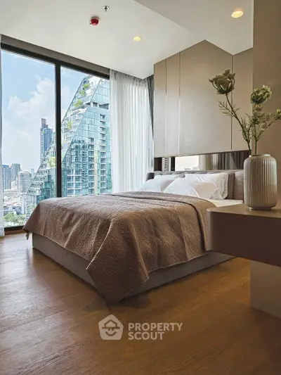 Luxurious bedroom with stunning city view and modern decor