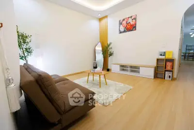 Modern living room with cozy sofa and stylish decor