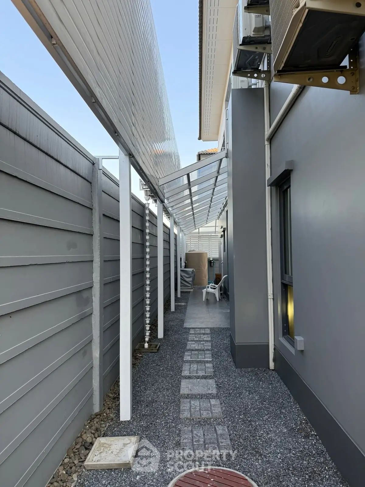 Modern exterior walkway with sleek design and covered pathway