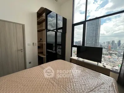 Modern bedroom with stunning city view and sleek furniture in high-rise apartment.