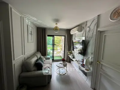 Stylish living room with modern decor and large window view