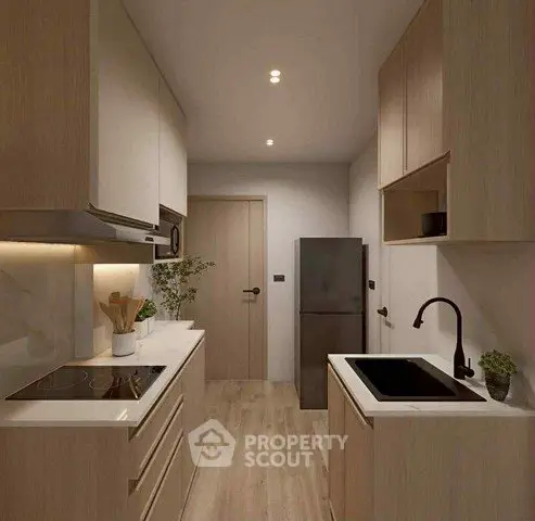 Modern kitchen with sleek cabinetry and built-in appliances in a cozy apartment.