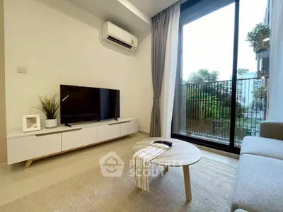 Modern living room with balcony view and stylish decor