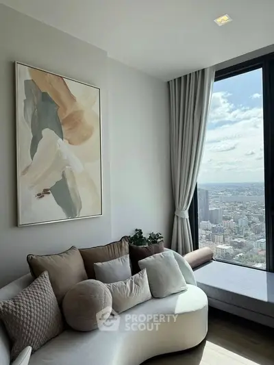Stylish living room with modern art and panoramic city view