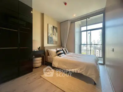 Modern bedroom with city view and stylish decor