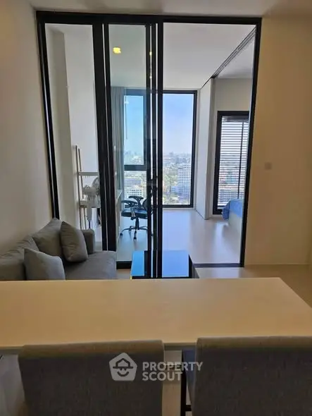 Modern apartment interior with open layout and city view