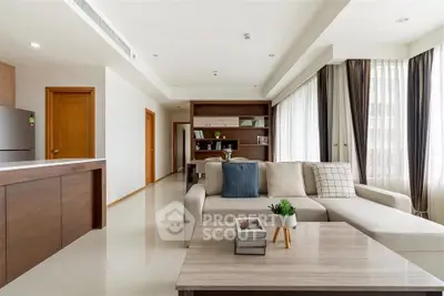 Spacious modern living room with elegant decor and natural light