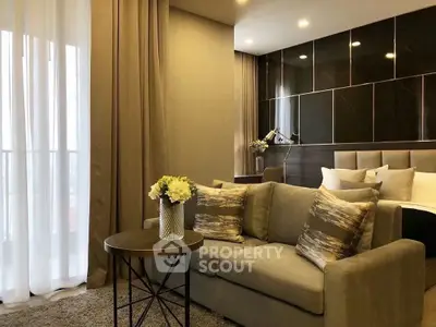 Luxurious modern living room with elegant decor and plush sofa