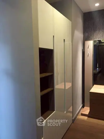 Modern interior with sleek storage solutions and elegant design.