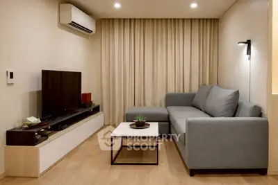 Modern living room with sleek furniture and ambient lighting