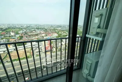 Stunning high-rise balcony with panoramic city view, perfect for urban living enthusiasts.