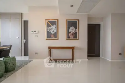 Elegant interior with modern decor and stylish artwork in a spacious living area.