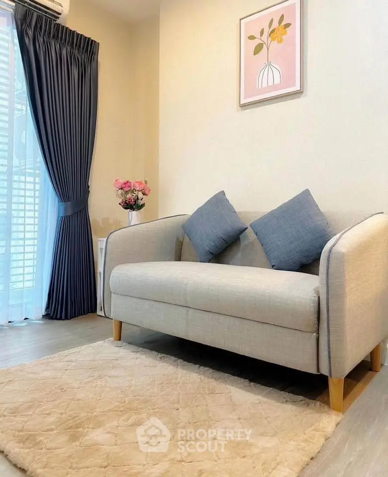 Cozy living room with elegant sofa and stylish decor, perfect for relaxation and comfort.