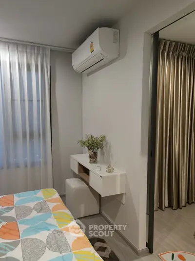 Modern bedroom with air conditioning and stylish decor